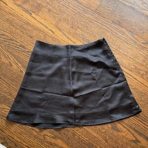 Black satin mini skirt